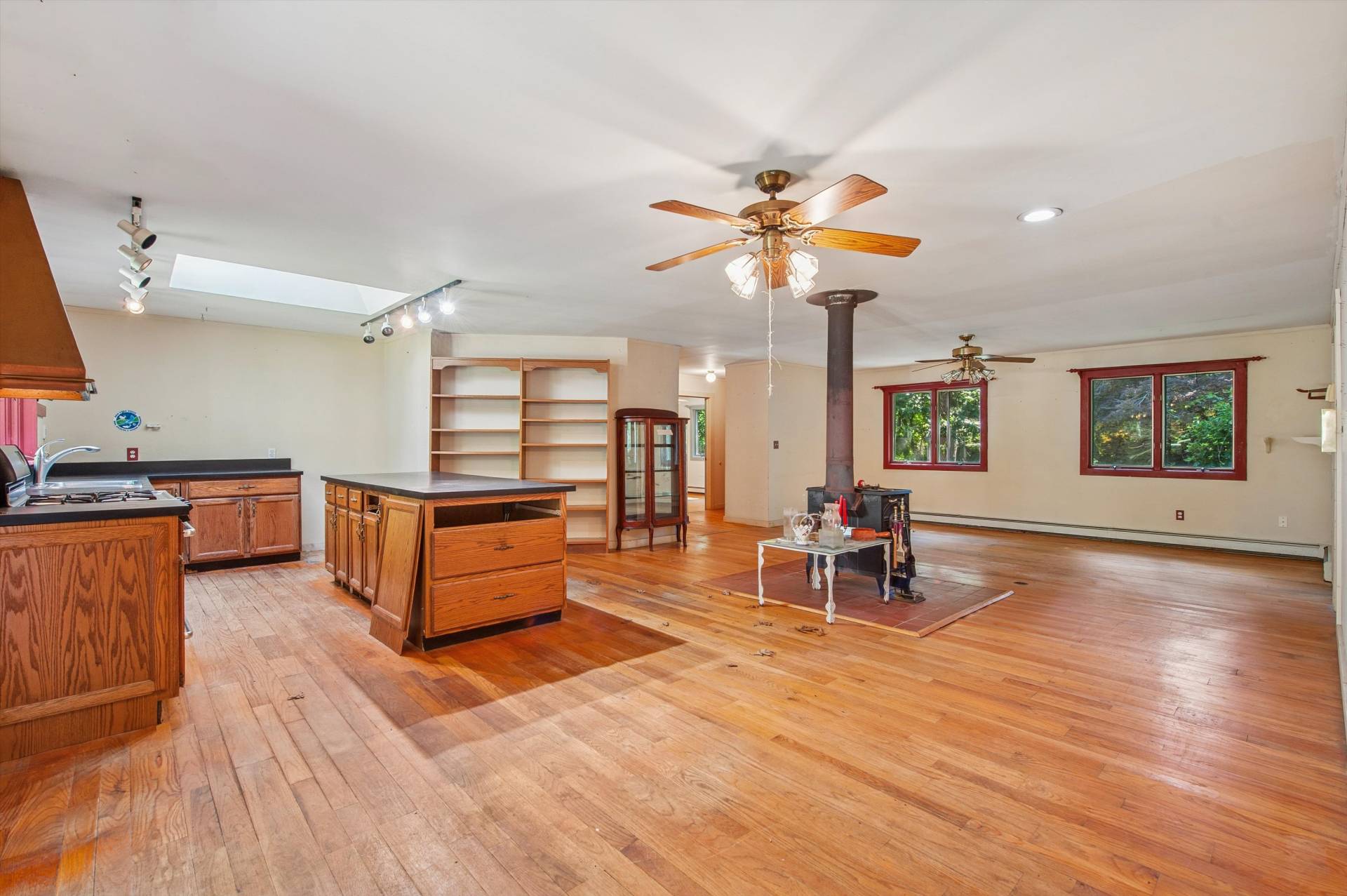27 Jagger Lane Westhampton, NY 11977 - Photo 6 of 12 a living room with furniture and a wooden floor