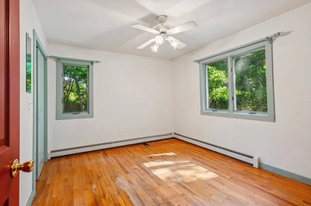 an empty room with windows