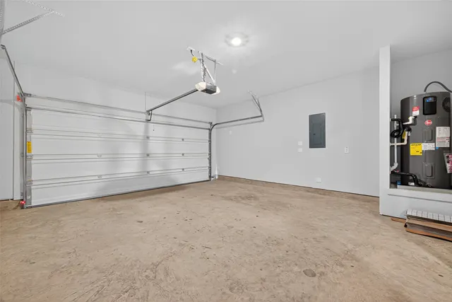 a view of a house with backyard and a chair