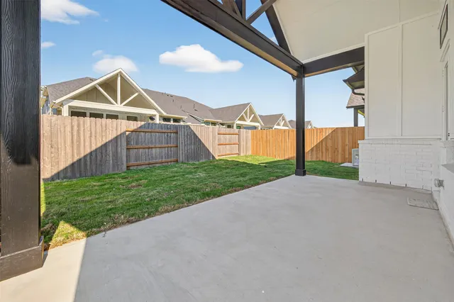 a house view with a play ground in front of it