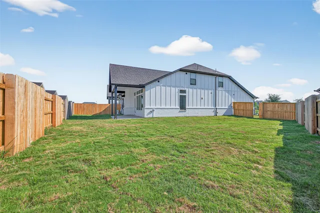 a house view with a garden space
