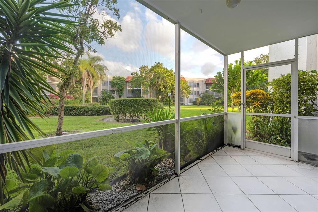 3774 Inverrary Boulevard, Unit 104P Fort Lauderdale, FL 33319 - Photo 2 of 22 a view of a garden