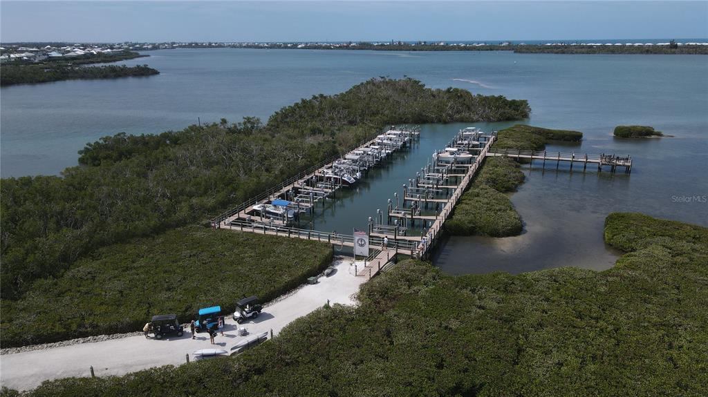 9203 Griggs Road, Unit D302 Englewood, FL 34224 - Photo 61 of 73 a view of a lake with outdoor space