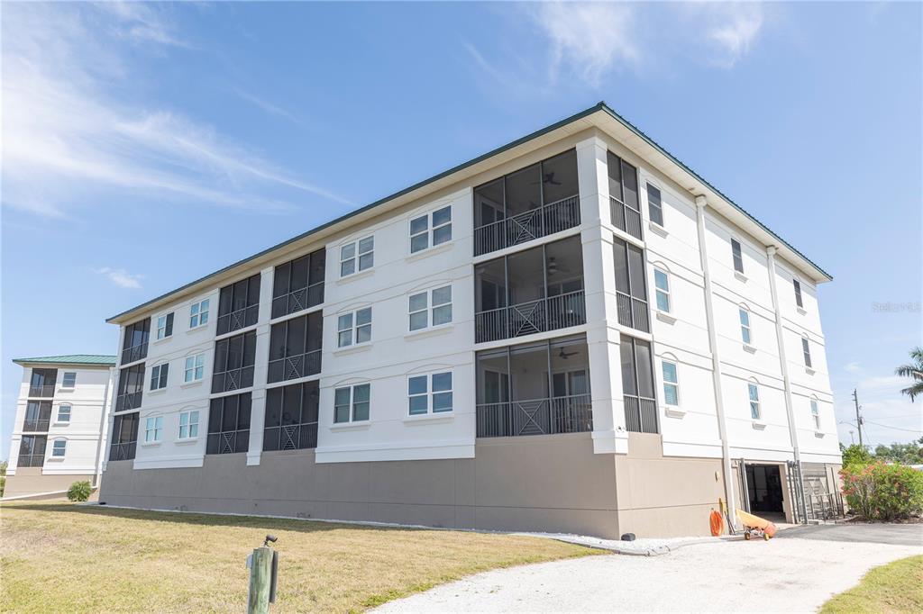 9203 Griggs Road, Unit D302 Englewood, FL 34224 - Photo 71 of 73 a front view of a building