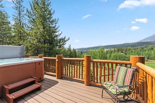 a view of a two chairs in the roof deck