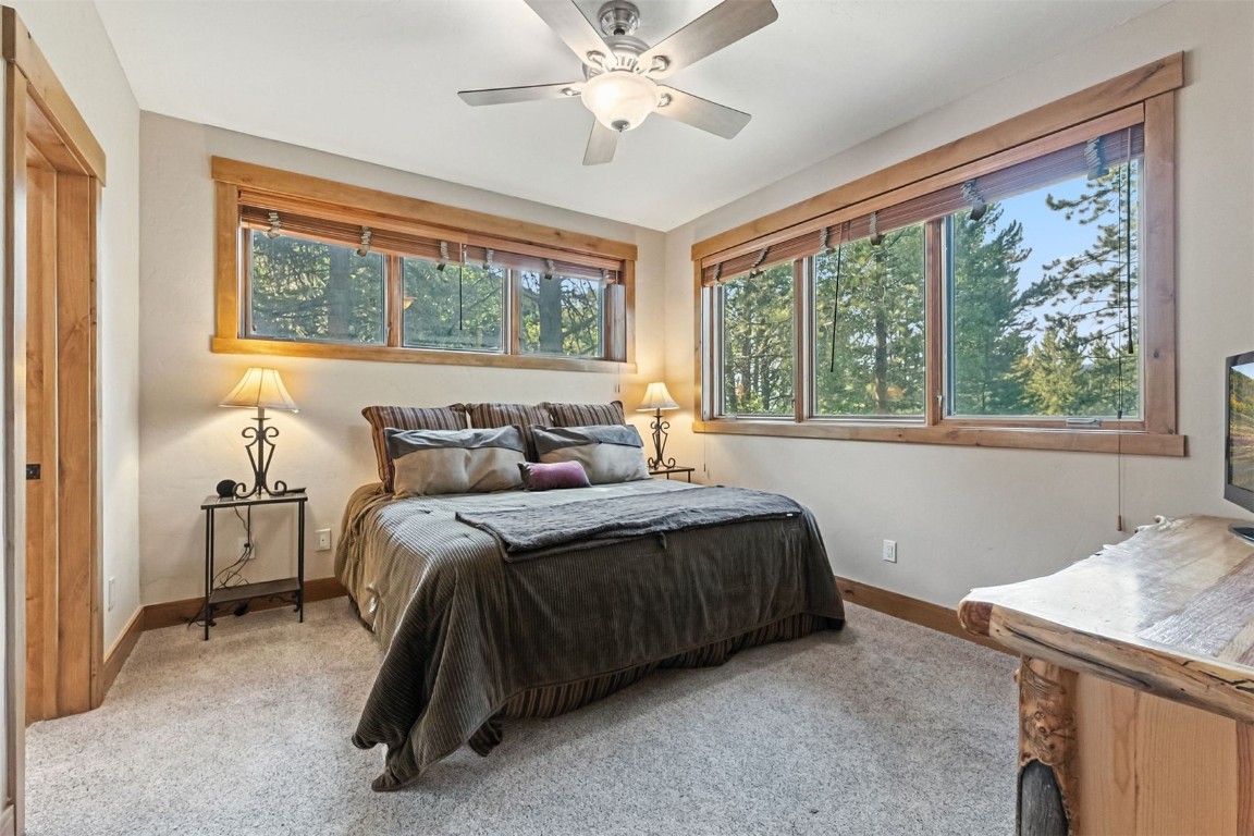 1730 Red Hawk Road Silverthorne, CO 80498 - Photo 31 of 50 a bedroom with a bed and a window