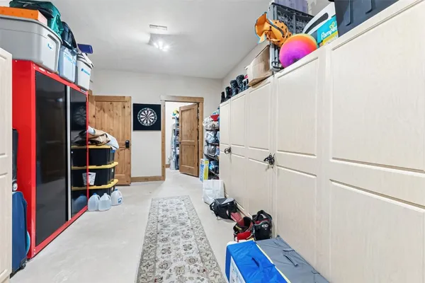 a room with furniture and a flat screen tv