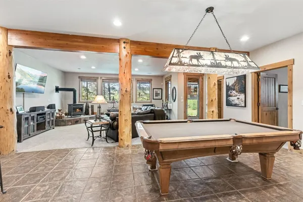 a view of a lush green hillside and houses