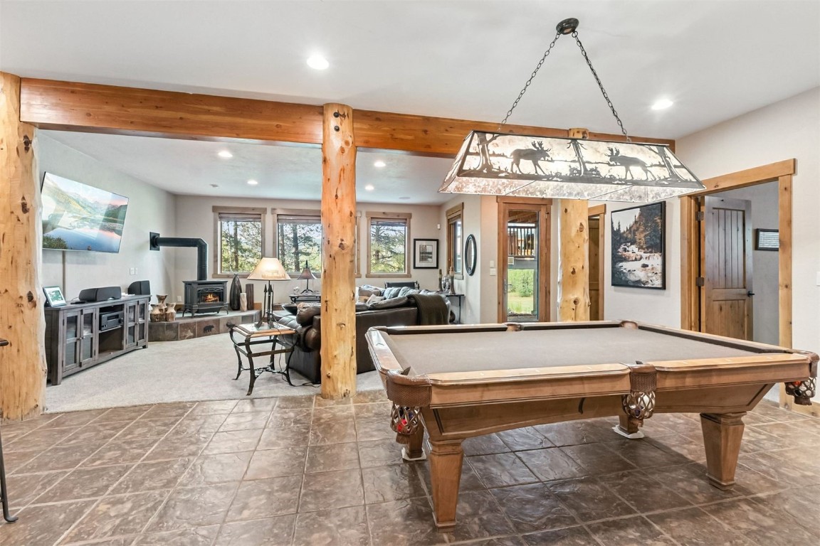1730 Red Hawk Road Silverthorne, CO 80498 - Photo 45 of 50 a room with pool table and windows