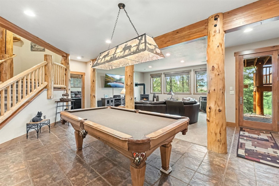 1730 Red Hawk Road Silverthorne, CO 80498 - Photo 8 of 50 a room with pool table and windows