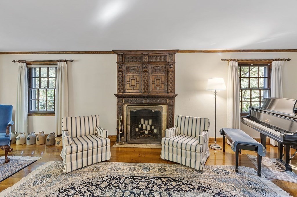 9 Aylesbury Road Worcester, MA 01609 - Photo 12 of 40 a living room with furniture and a fireplace