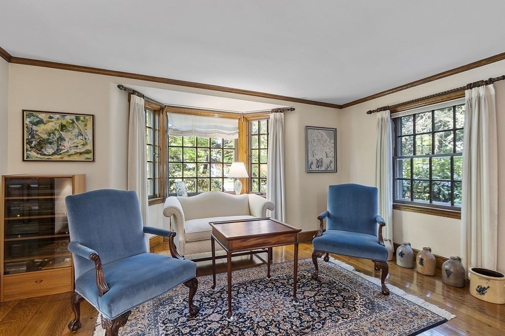 9 Aylesbury Road Worcester, MA 01609 - Photo 13 of 40 a living room with furniture a rug a lamp and a large window