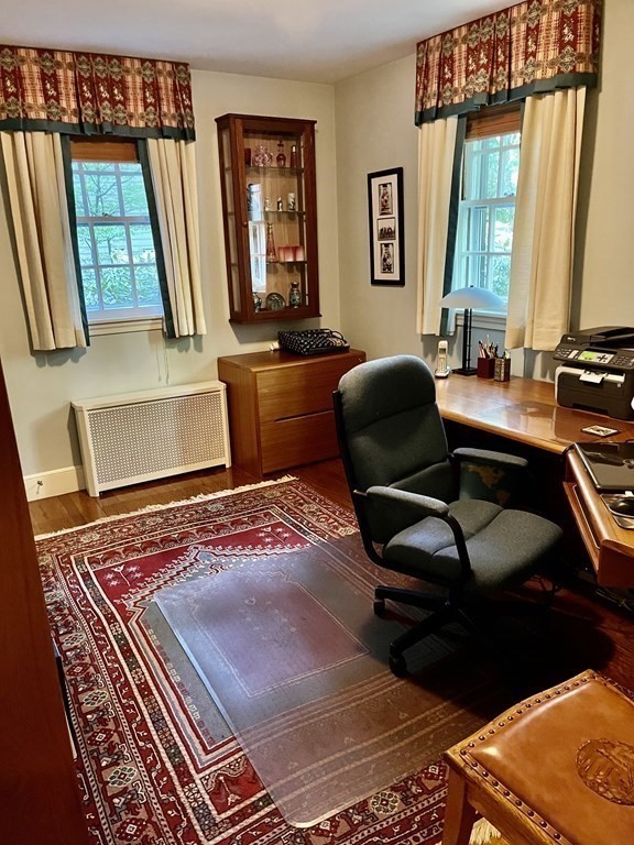 9 Aylesbury Road Worcester, MA 01609 - Photo 25 of 40 a living room with a couch and a window