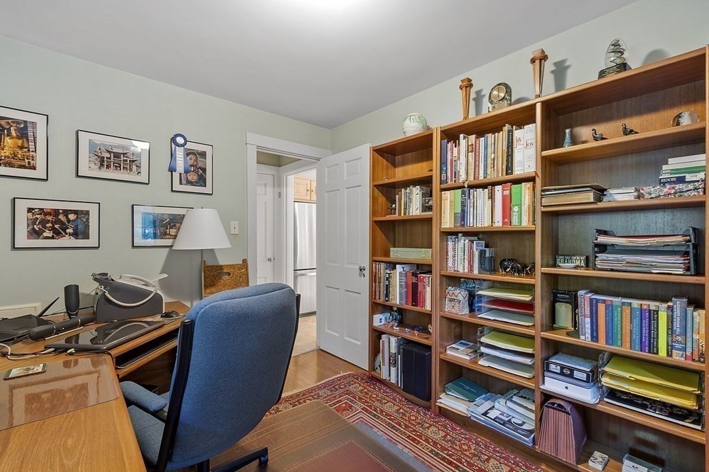 9 Aylesbury Road Worcester, MA 01609 - Photo 27 of 40 a view of a workspace with bookshelf