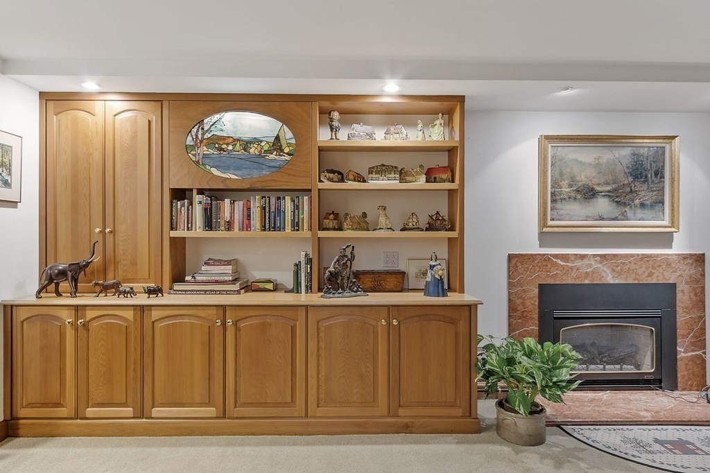 9 Aylesbury Road Worcester, MA 01609 - Photo 35 of 40 a view of a kitchen with furniture and a fireplace