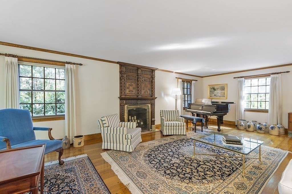 9 Aylesbury Road Worcester, MA 01609 - Photo 9 of 40 a living room with furniture windows and a fireplace