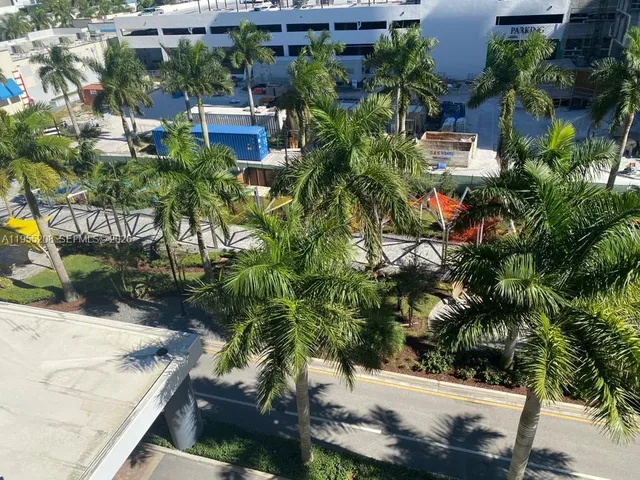 a view of a room with a large window