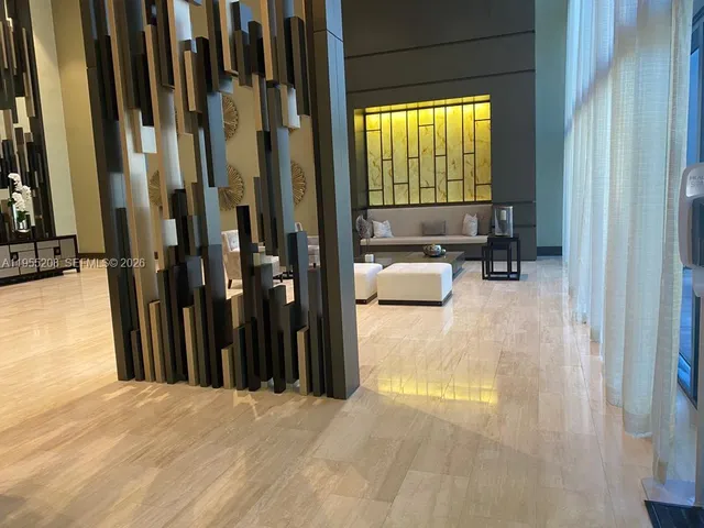 a view of a living room with a bathroom