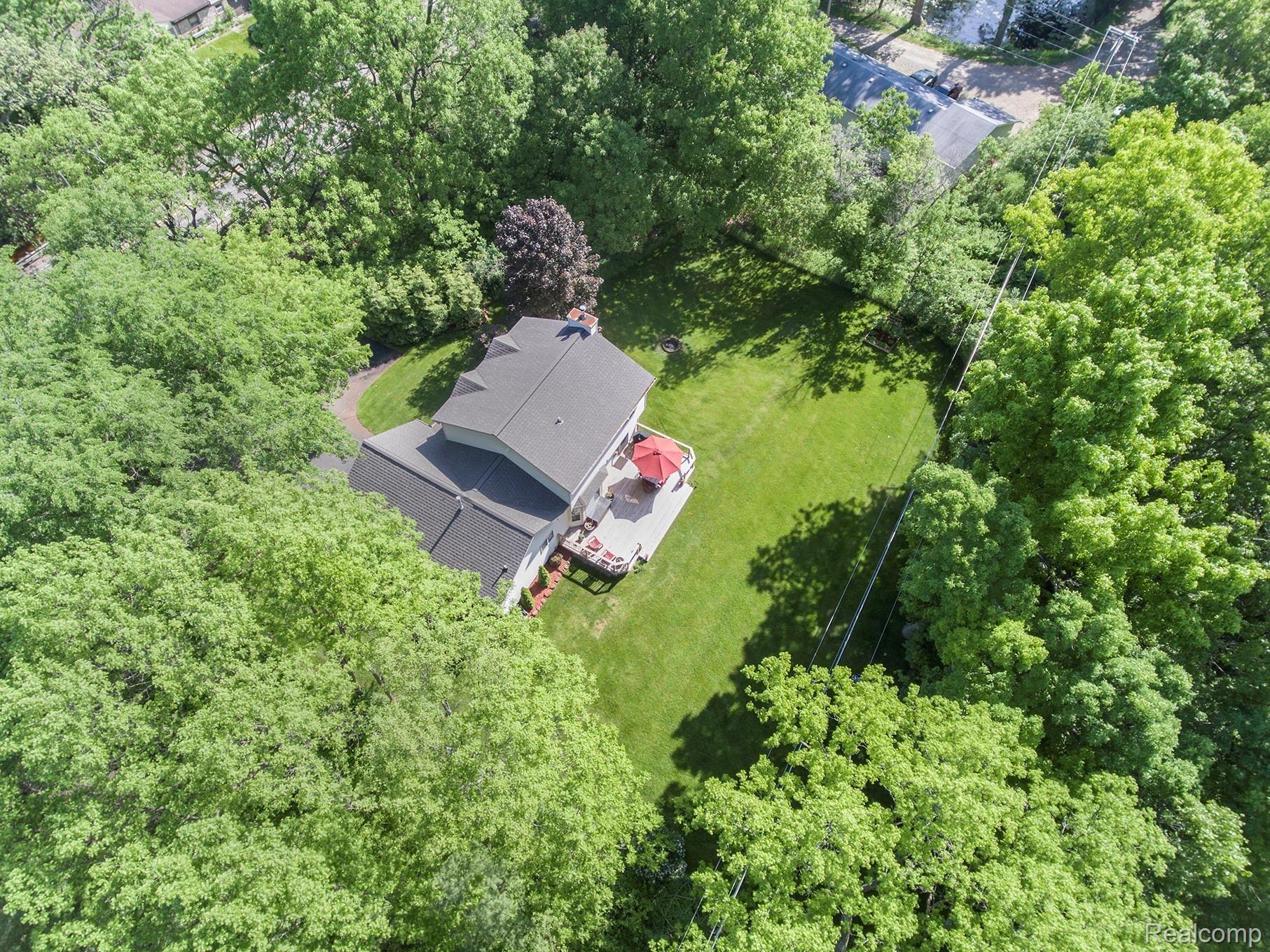 360 East Davisburg Road Holly, MI 48442 - Photo 29 of 30 deep wooded backyard