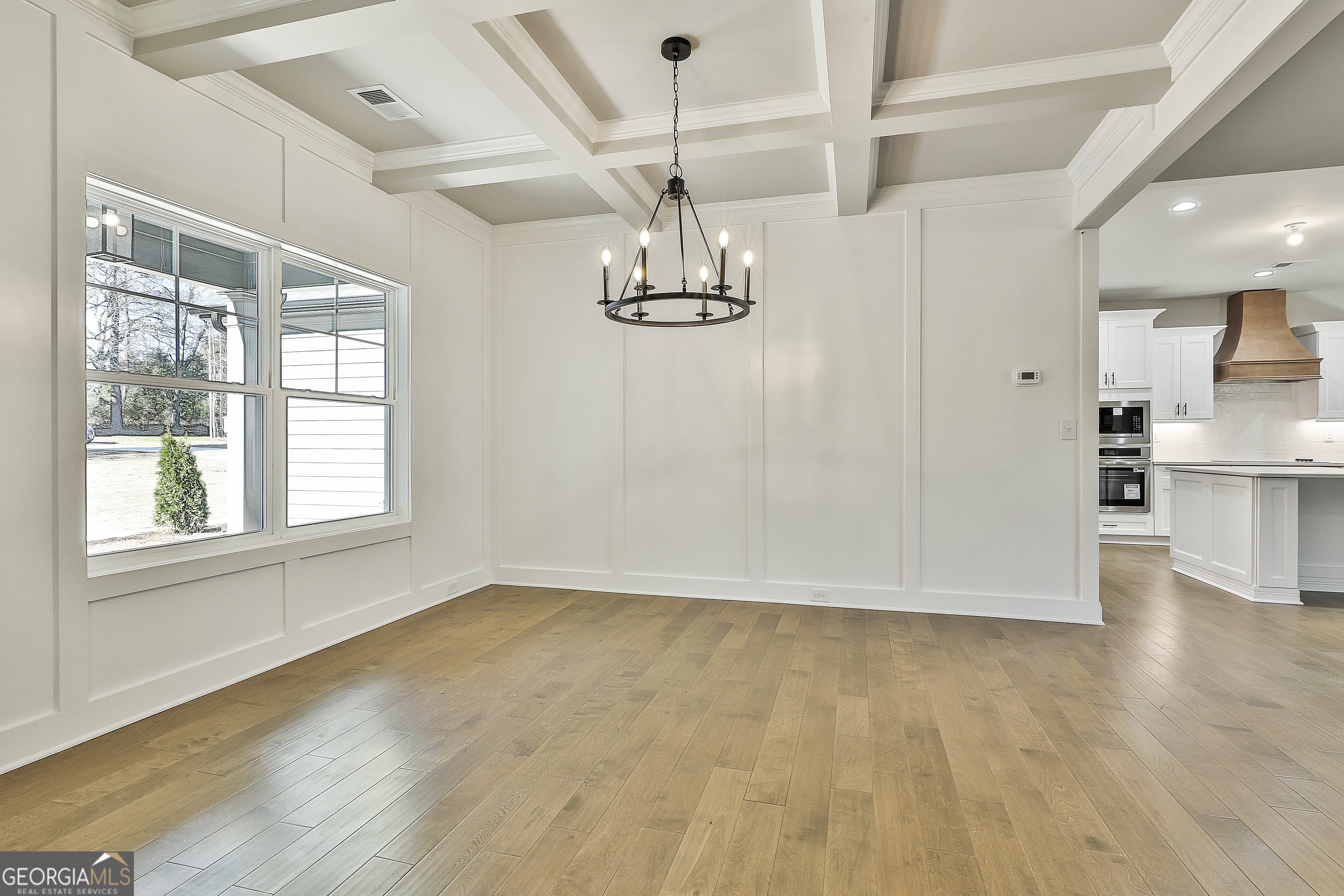 837 Alex Stephens Road Moreland, GA 30259 - Photo 11 of 50 a view of empty room with wooden floor and windows