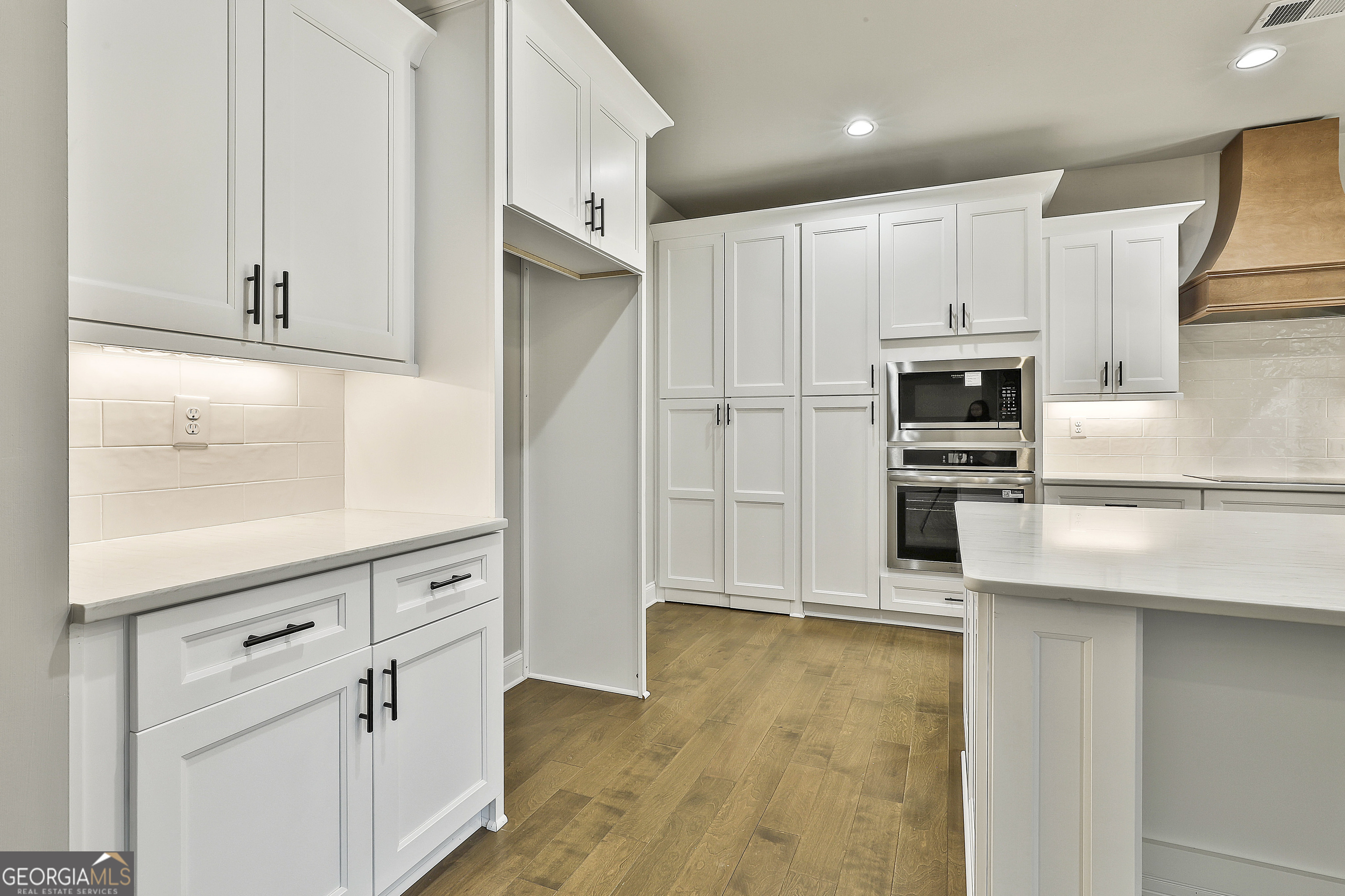 837 Alex Stephens Road Moreland, GA 30259 - Photo 21 of 50 a kitchen with stainless steel appliances a refrigerator sink and cabinets