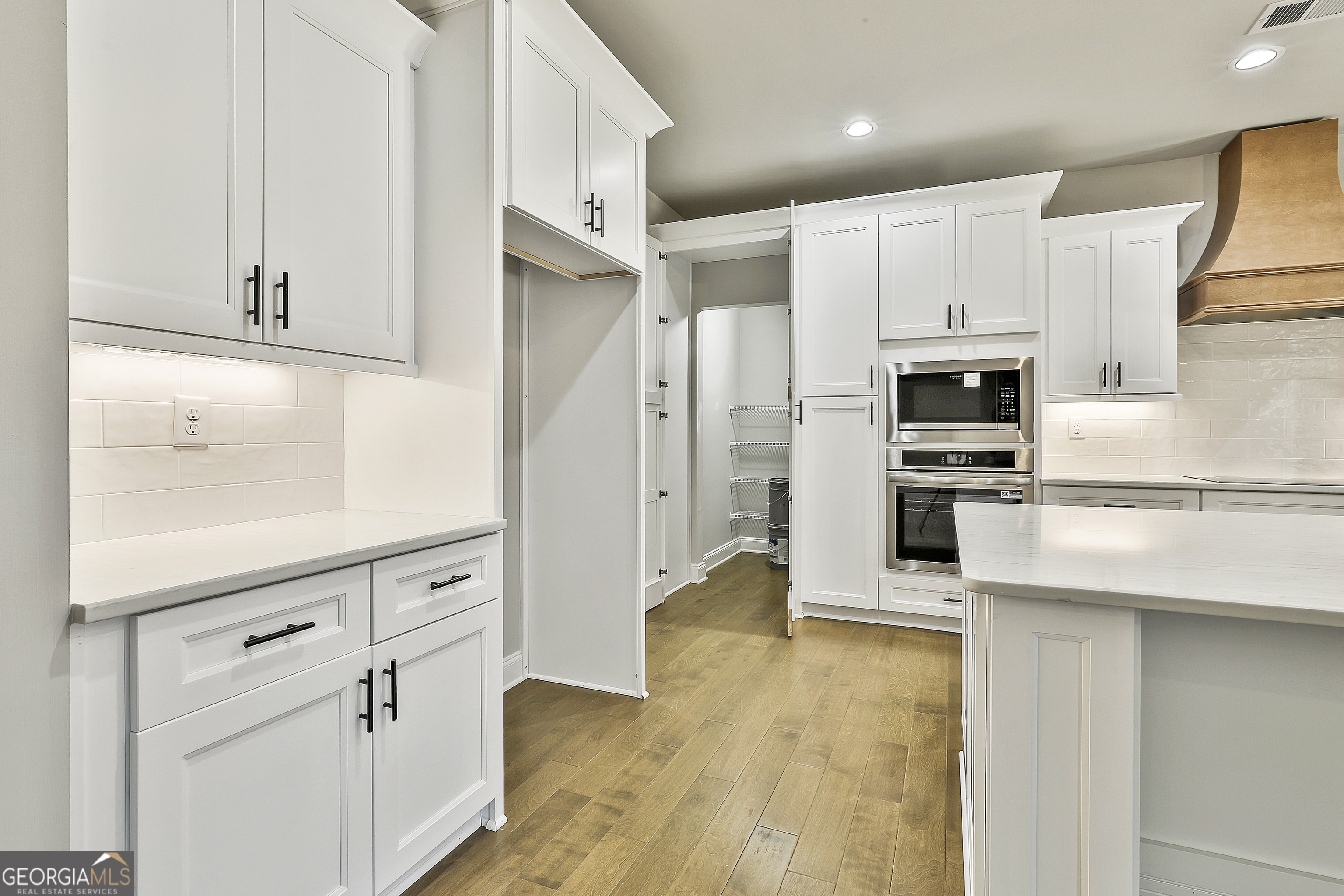 837 Alex Stephens Road Moreland, GA 30259 - Photo 22 of 50 a kitchen with stainless steel appliances a refrigerator sink and cabinets