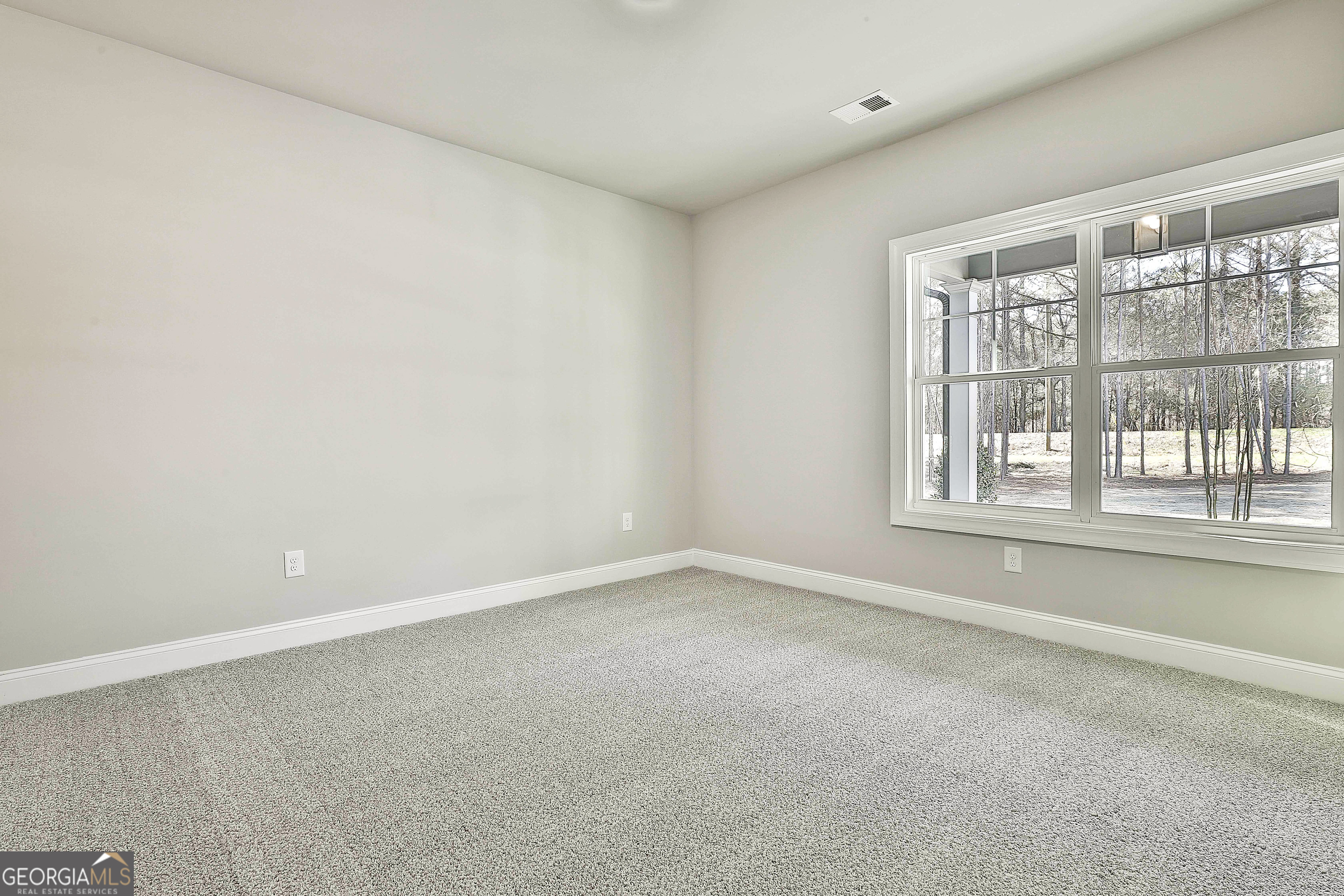 837 Alex Stephens Road Moreland, GA 30259 - Photo 31 of 50 an empty room with a window