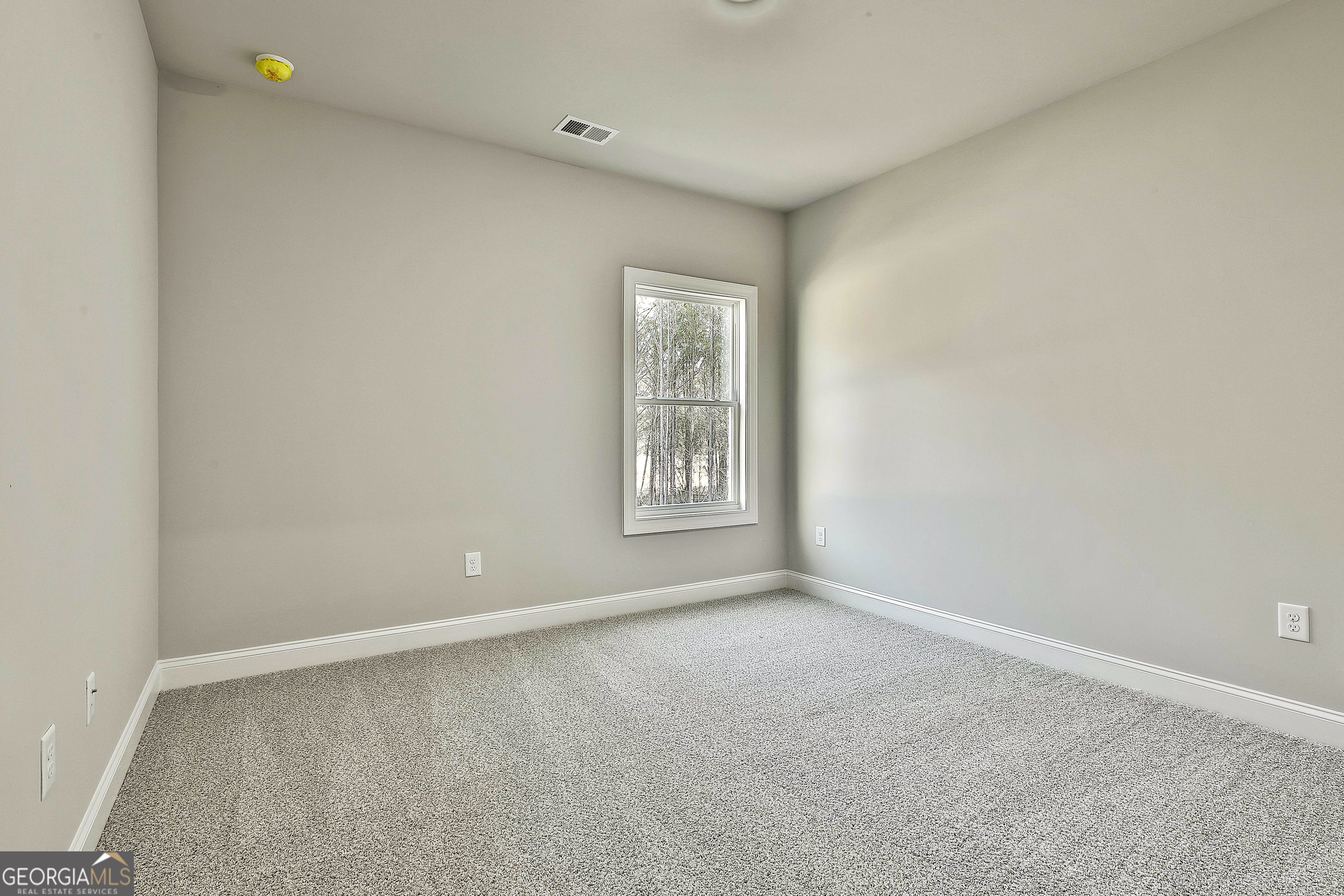 837 Alex Stephens Road Moreland, GA 30259 - Photo 33 of 50 a view of an empty room with a window