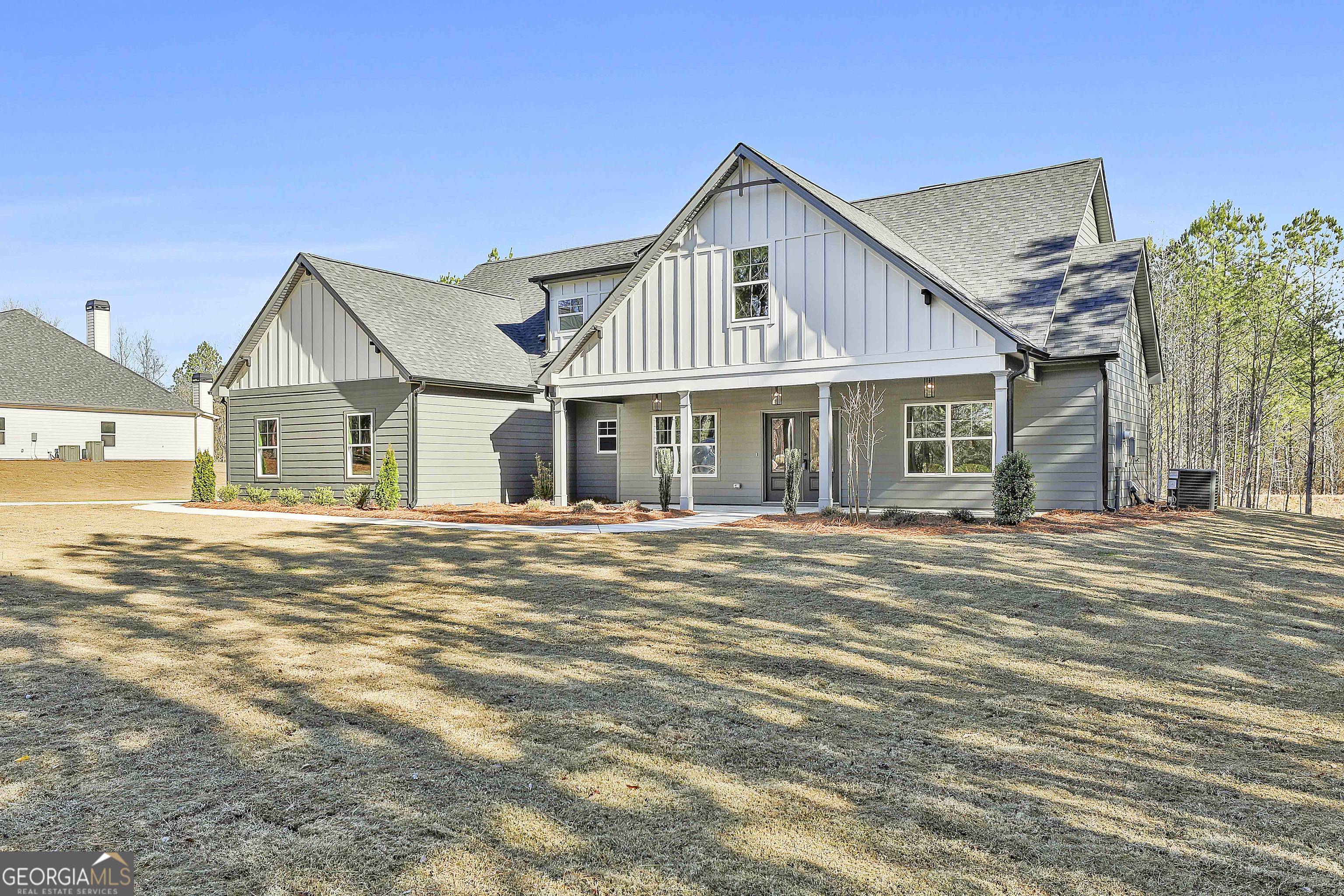 837 Alex Stephens Road Moreland, GA 30259 - Photo 4 of 50 a front view of a house with a garden