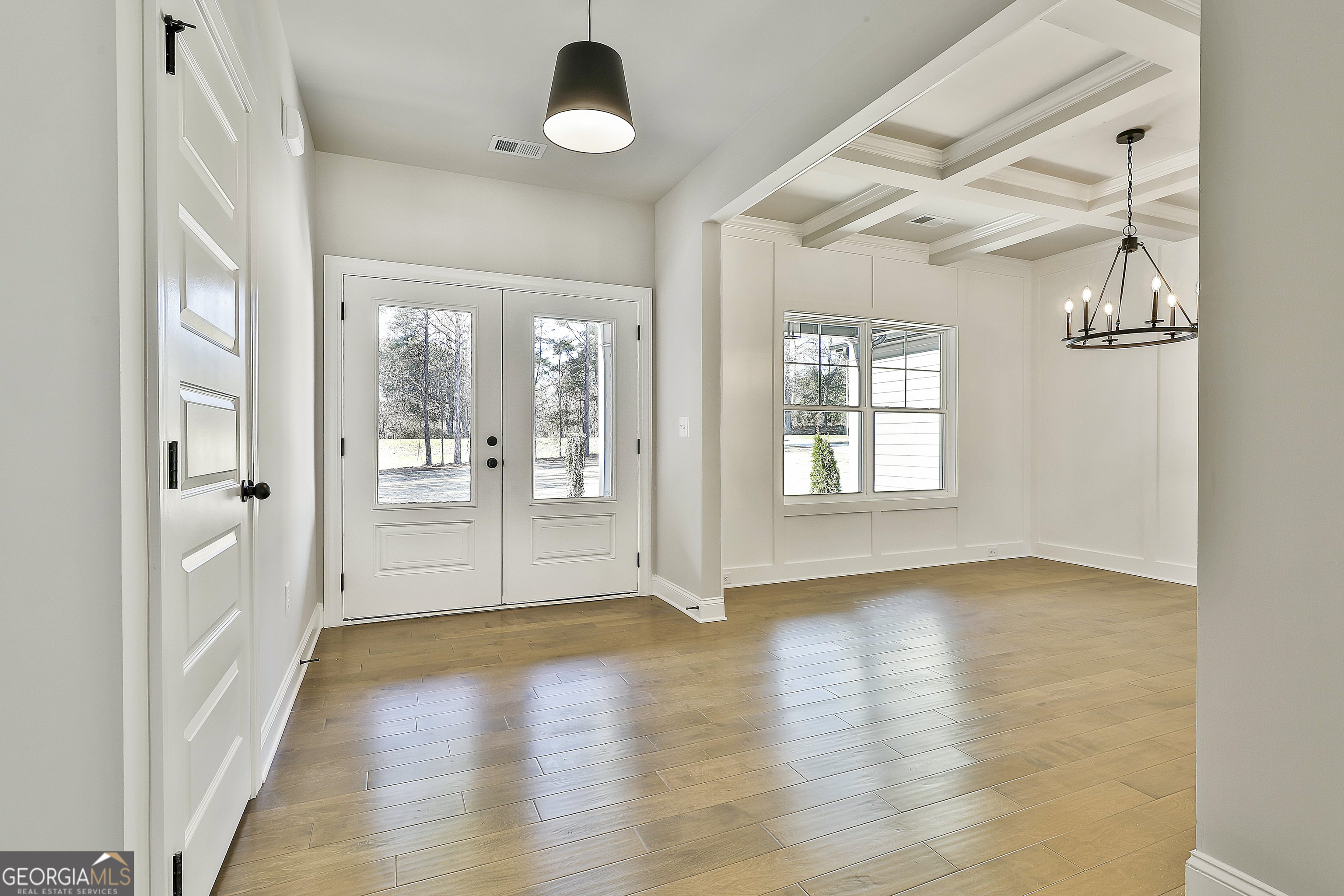 837 Alex Stephens Road Moreland, GA 30259 - Photo 10 of 50 a view of a hallway with wooden floor and a window