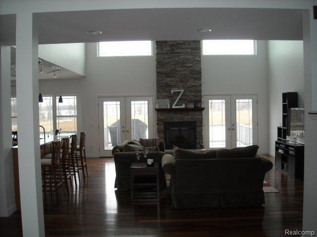 13687 Stowell Road Dundee, MI 48131 - Photo 2 of 25 Foyer and Fireplace
