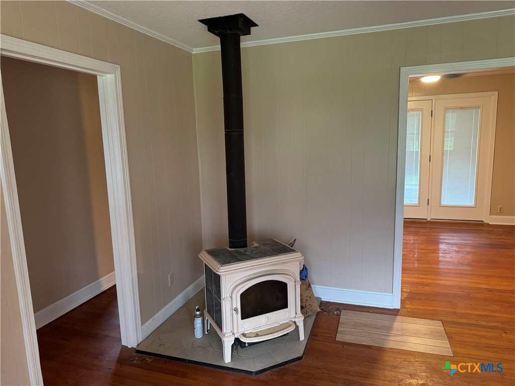 3510 Gun Club Road Temple, TX 76501 - Photo 15 of 17 a view of a room with wooden floor and white cabinet