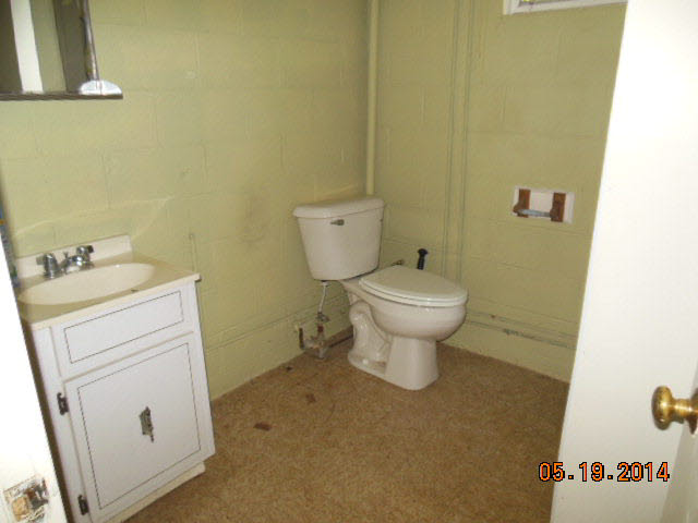 8644 Briery Branch Road Dayton, VA 22821 - Photo 7 of 10 a bathroom with a sink and a toilet