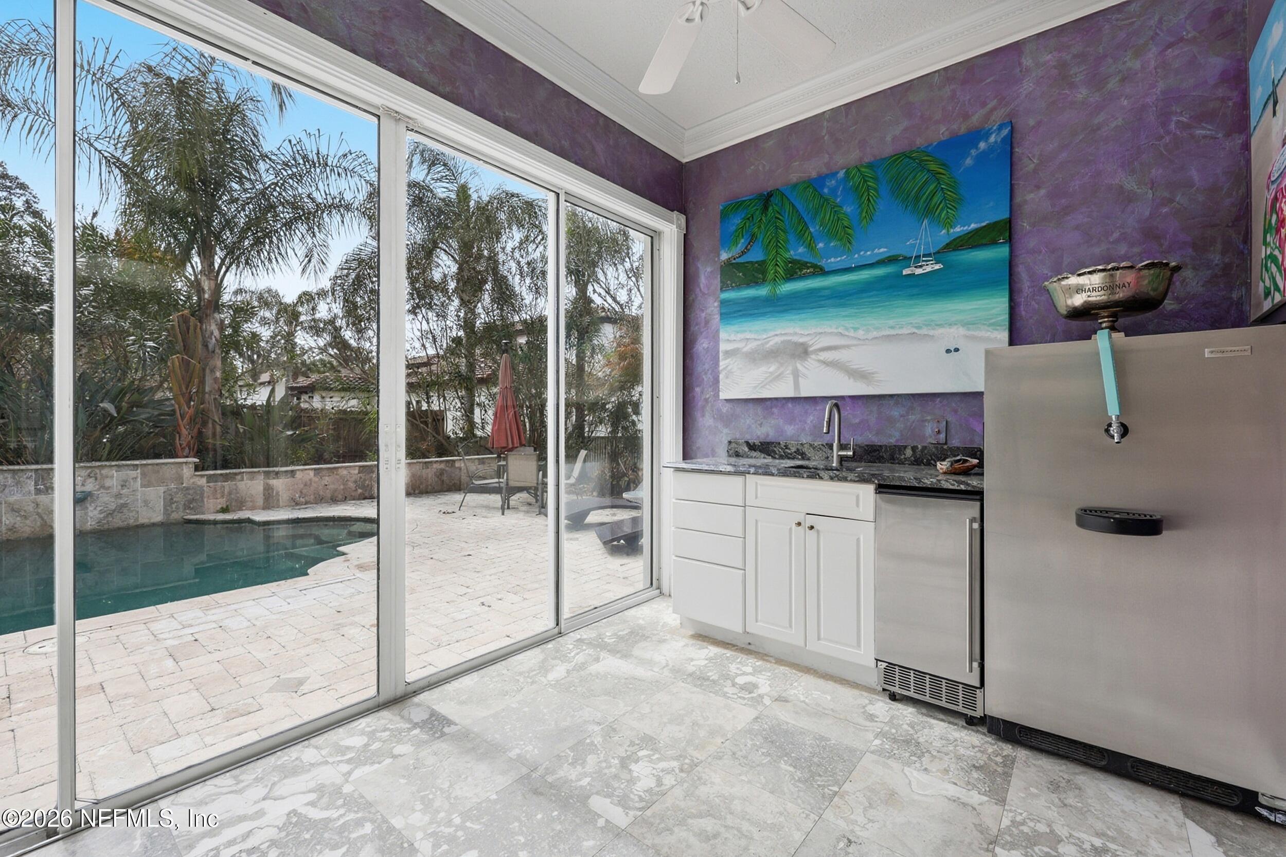 40 Tallwood Road Jacksonville Beach, FL 32250 - Photo 30 of 75 a bathroom with a tub sink and mirror