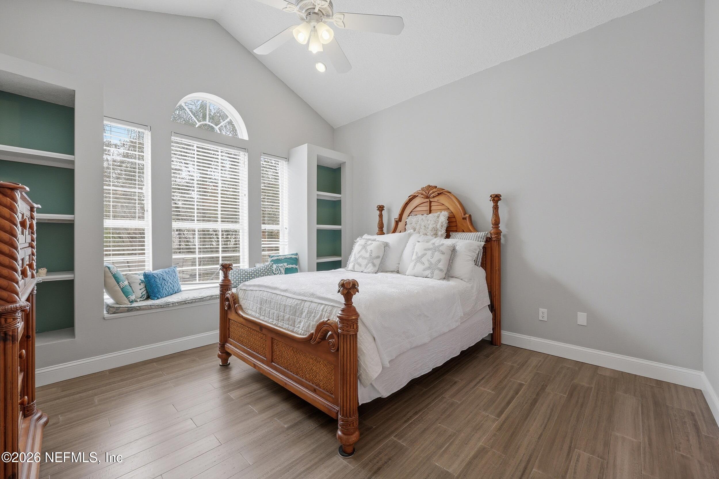 40 Tallwood Road Jacksonville Beach, FL 32250 - Photo 48 of 75 a bed sitting in a bedroom next to a window