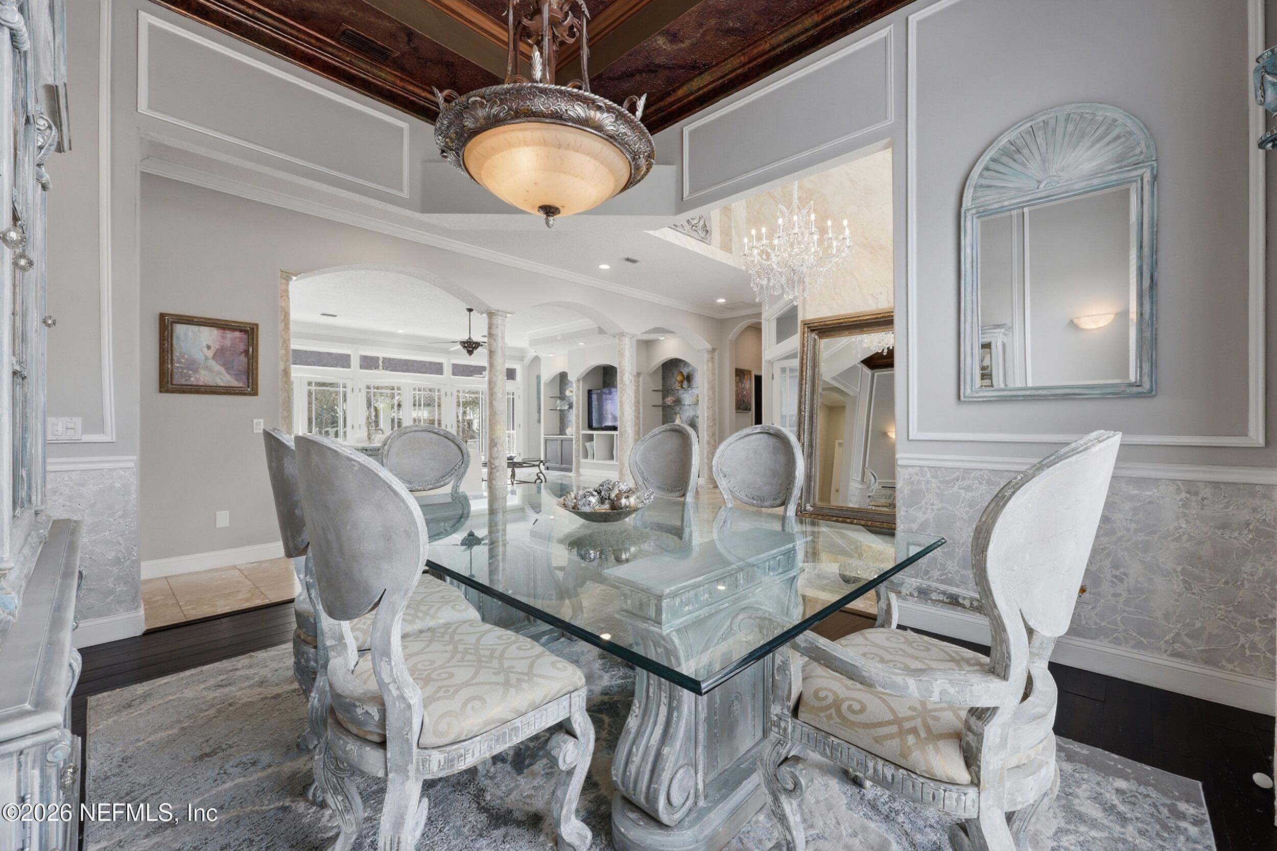 40 Tallwood Road Jacksonville Beach, FL 32250 - Photo 6 of 75 a view of a dining room with furniture and chandelier
