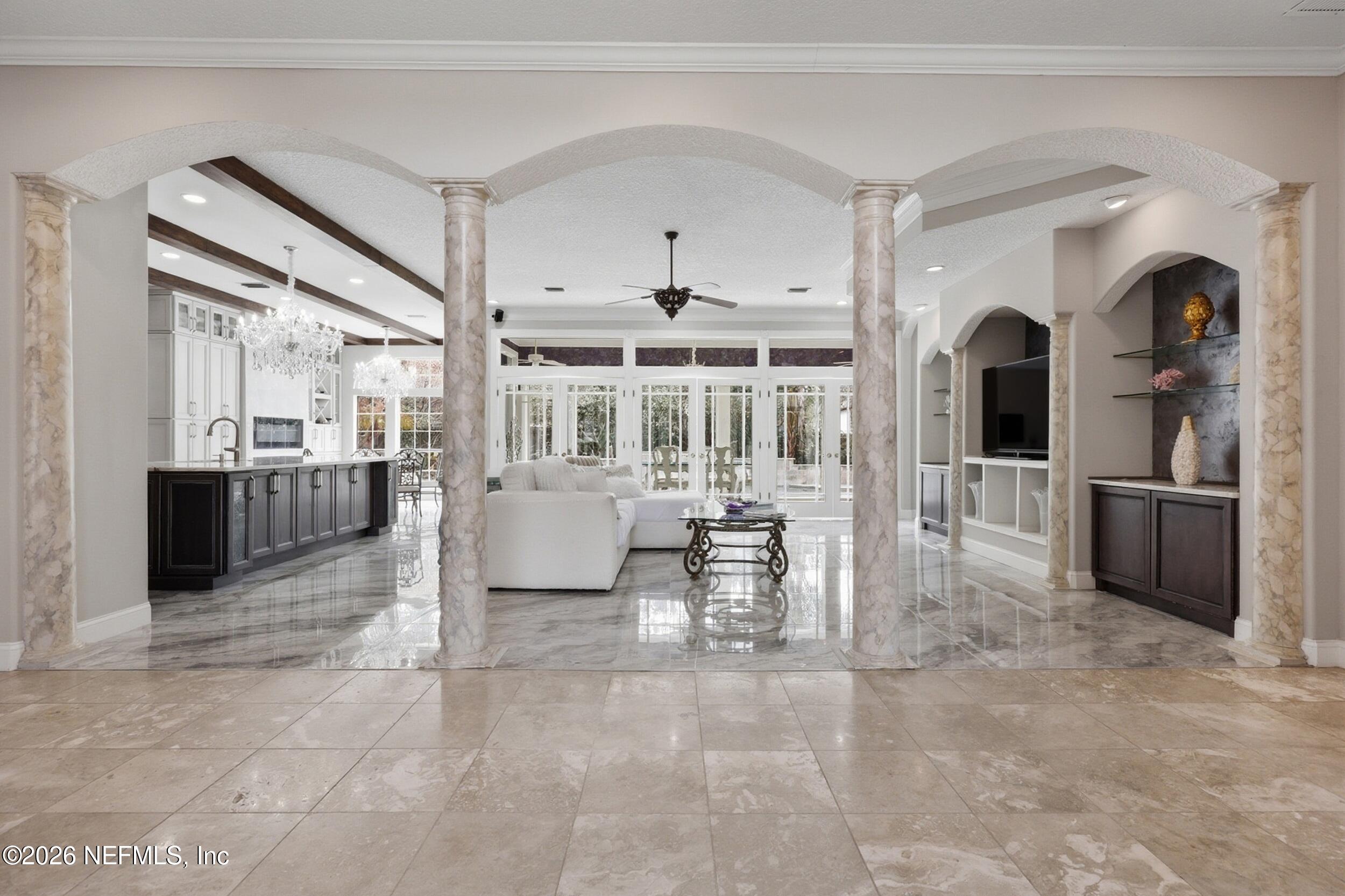 40 Tallwood Road Jacksonville Beach, FL 32250 - Photo 9 of 75 a living room with furniture and a fireplace