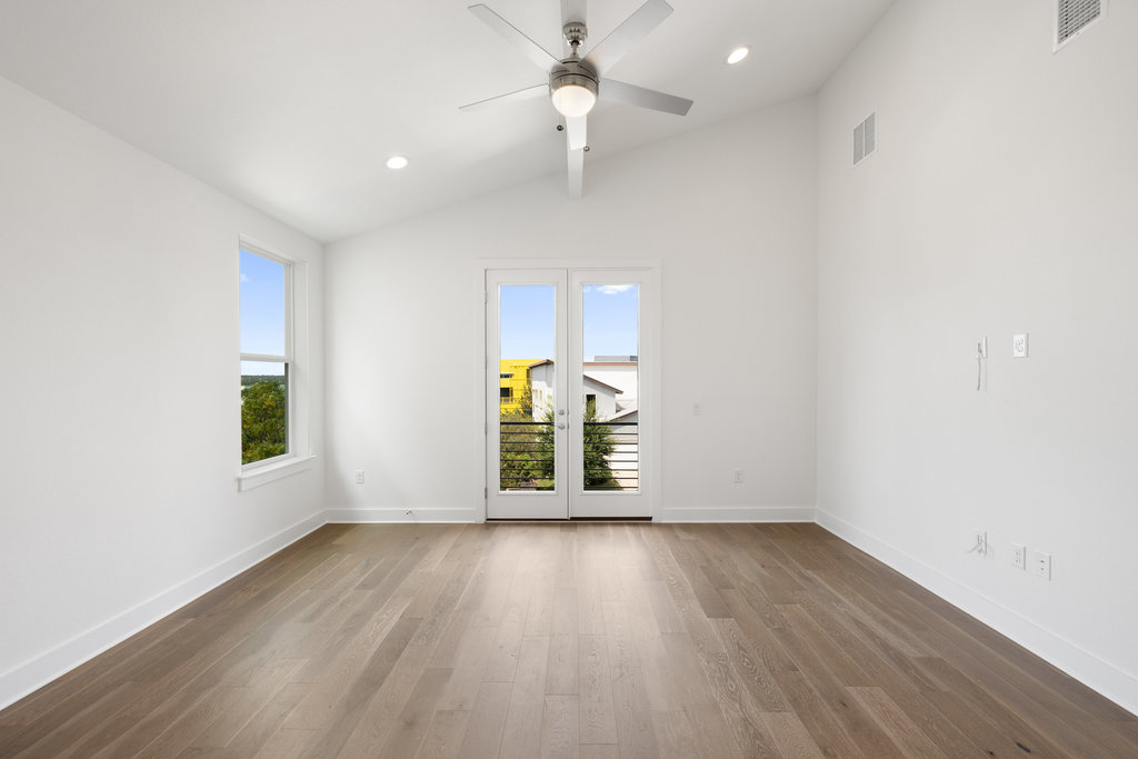 7321 Annette Cove Austin, TX 78724 - Photo 27 of 40 wooden floor in an empty room with a window
