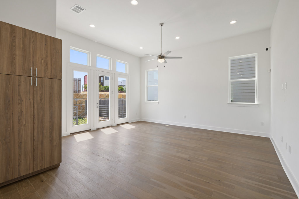 7321 Annette Cove Austin, TX 78724 - Photo 6 of 40 Open-concept living with soaring ceilings and abundant natural light.