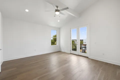 a view of a house with backyard porch and sitting area