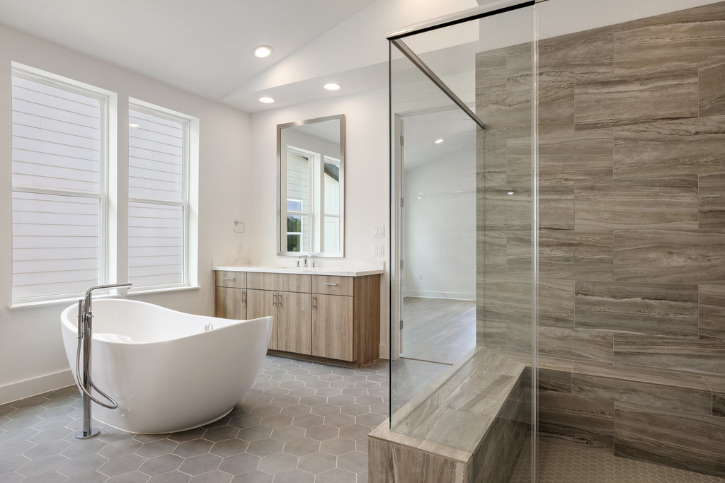 7321 Annette Cove Austin, TX 78724 - Photo 8 of 40 Spa-inspired bath with freestanding soaking tub and walk-in shower.