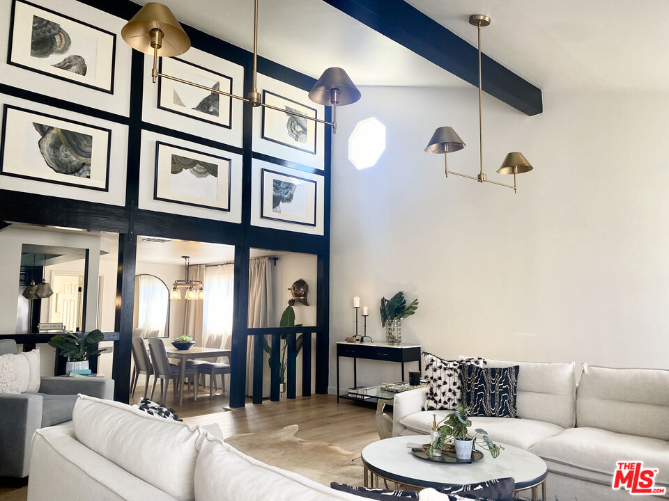 336 Highland Drive Oxnard, CA 93035 - Photo 4 of 25 a living room with furniture and a table