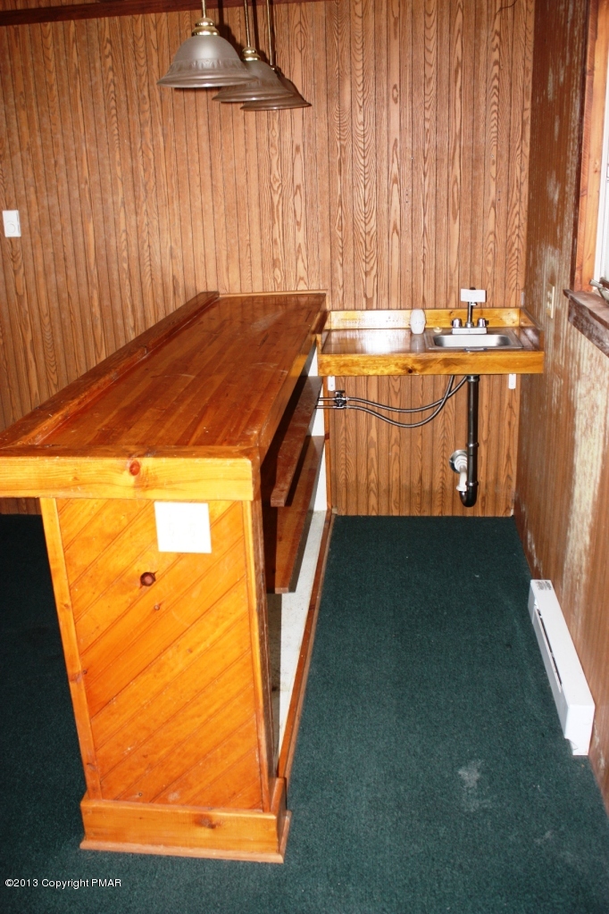 280 Gumbletown Road Paupack, PA 18451 - Photo 8 of 18 Bar with sink in living room