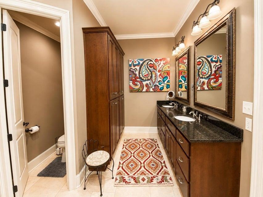 295 North Ridge Drive Saltillo, MS 38866 - Photo 20 of 38 a bathroom with a granite countertop sink and a mirror