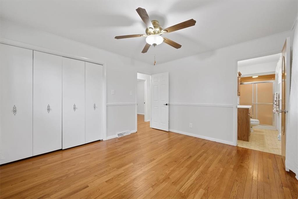 303 Chapin Road New Castle, PA 16105 - Photo 13 of 25 a view of an empty room and wooden floor