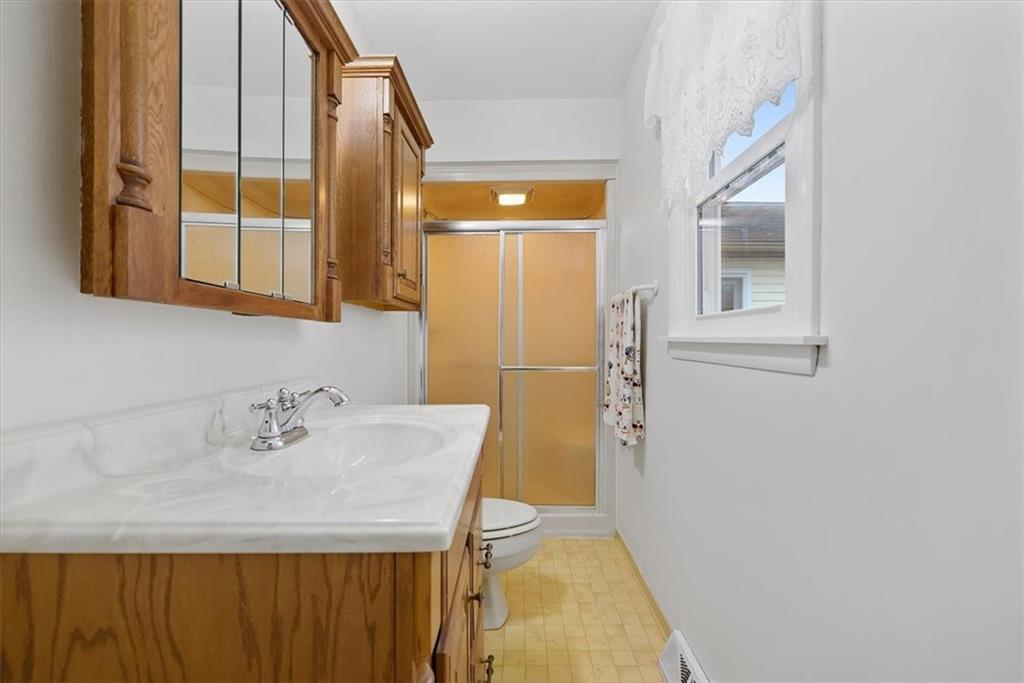 303 Chapin Road New Castle, PA 16105 - Photo 14 of 25 a bathroom with a sink and a mirror