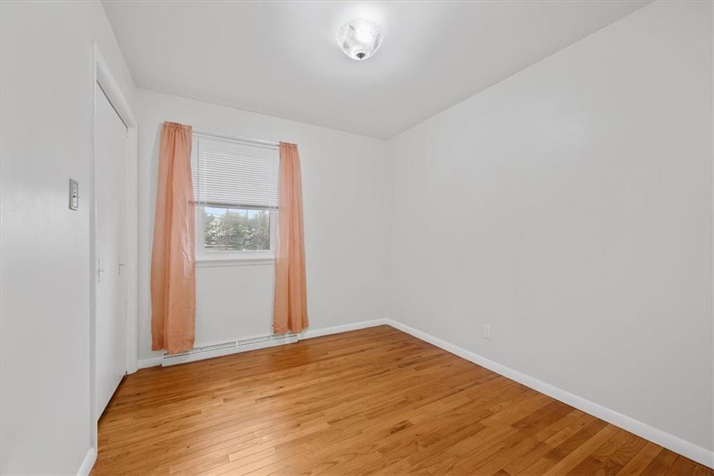303 Chapin Road New Castle, PA 16105 - Photo 16 of 25 a view of empty room with wooden floor