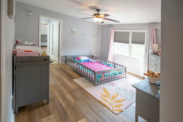 a bathroom with a sink double vanity and a mirror