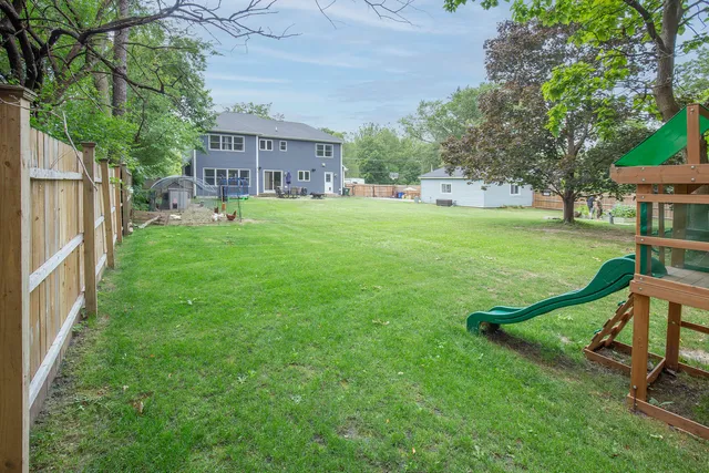 an aerial view of a house with balcony