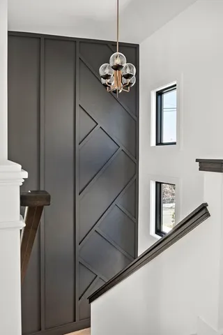 a bedroom with bed and window